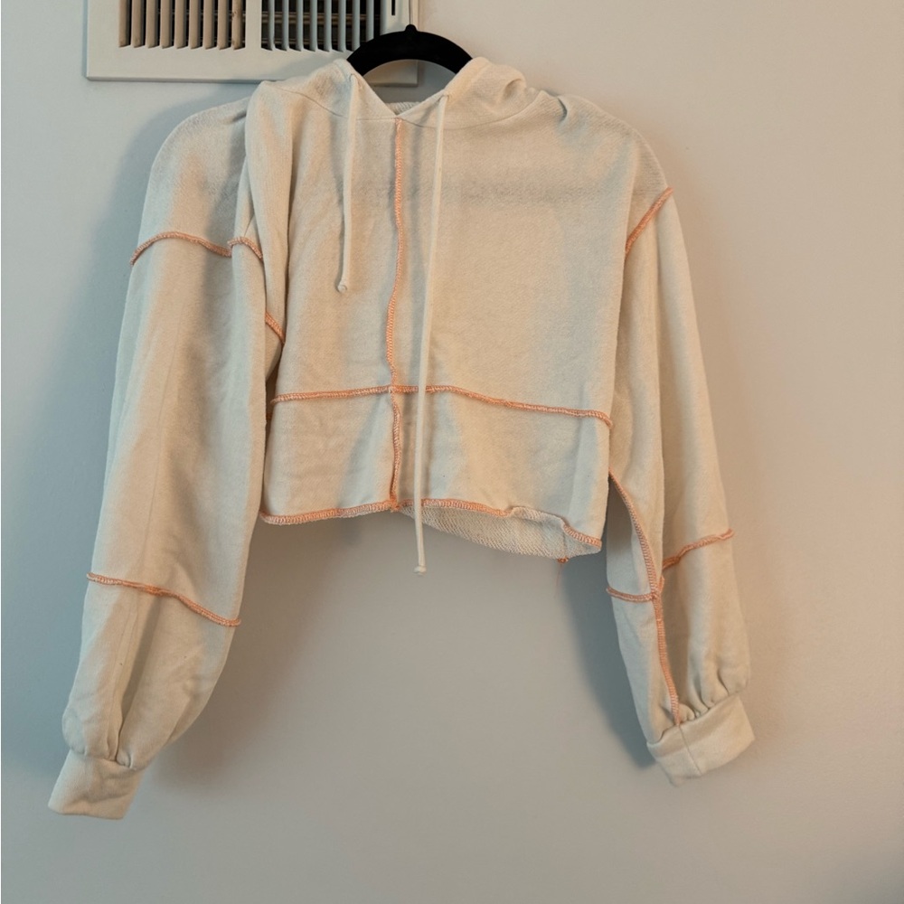 Cozy Cream Cropped Hoodie with Orange Accents